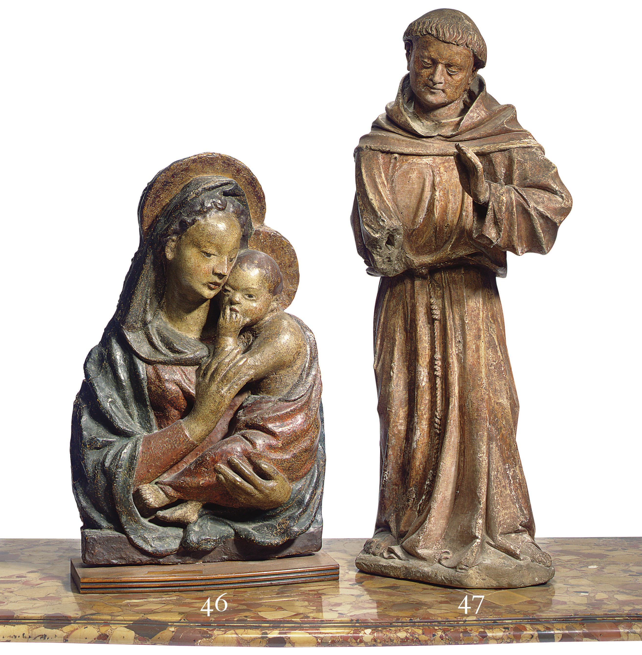 A POLYCHROME-DECORATED PLASTER RELIEF OF THE VIRGIN AND CHILD