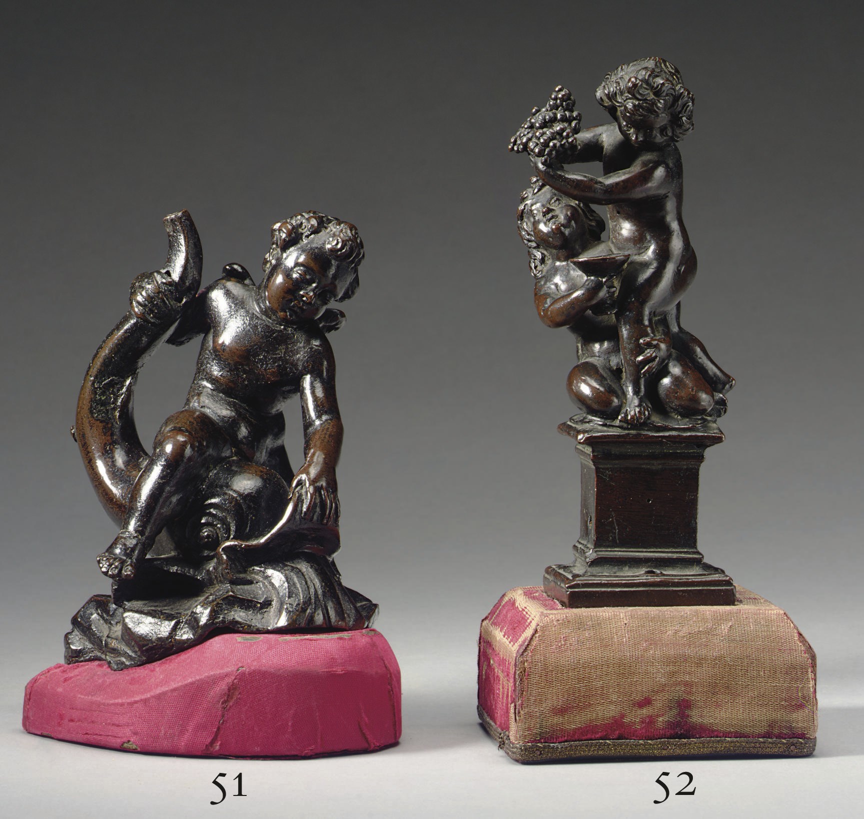 A BRONZE GROUP OF TWO PUTTI