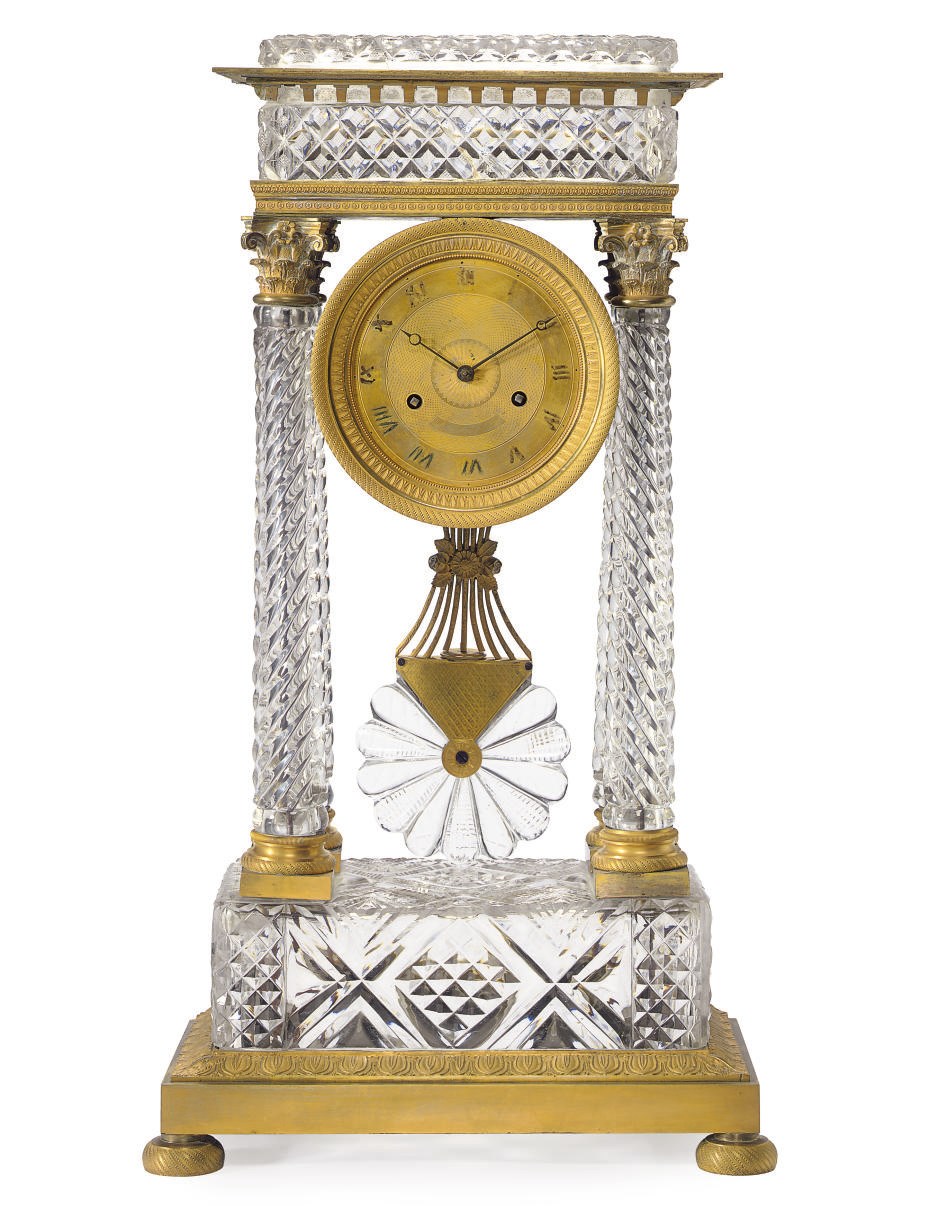 A CHARLES X ORMOLU AND CUT-GLASS PORTICO MANTEL CLOCK