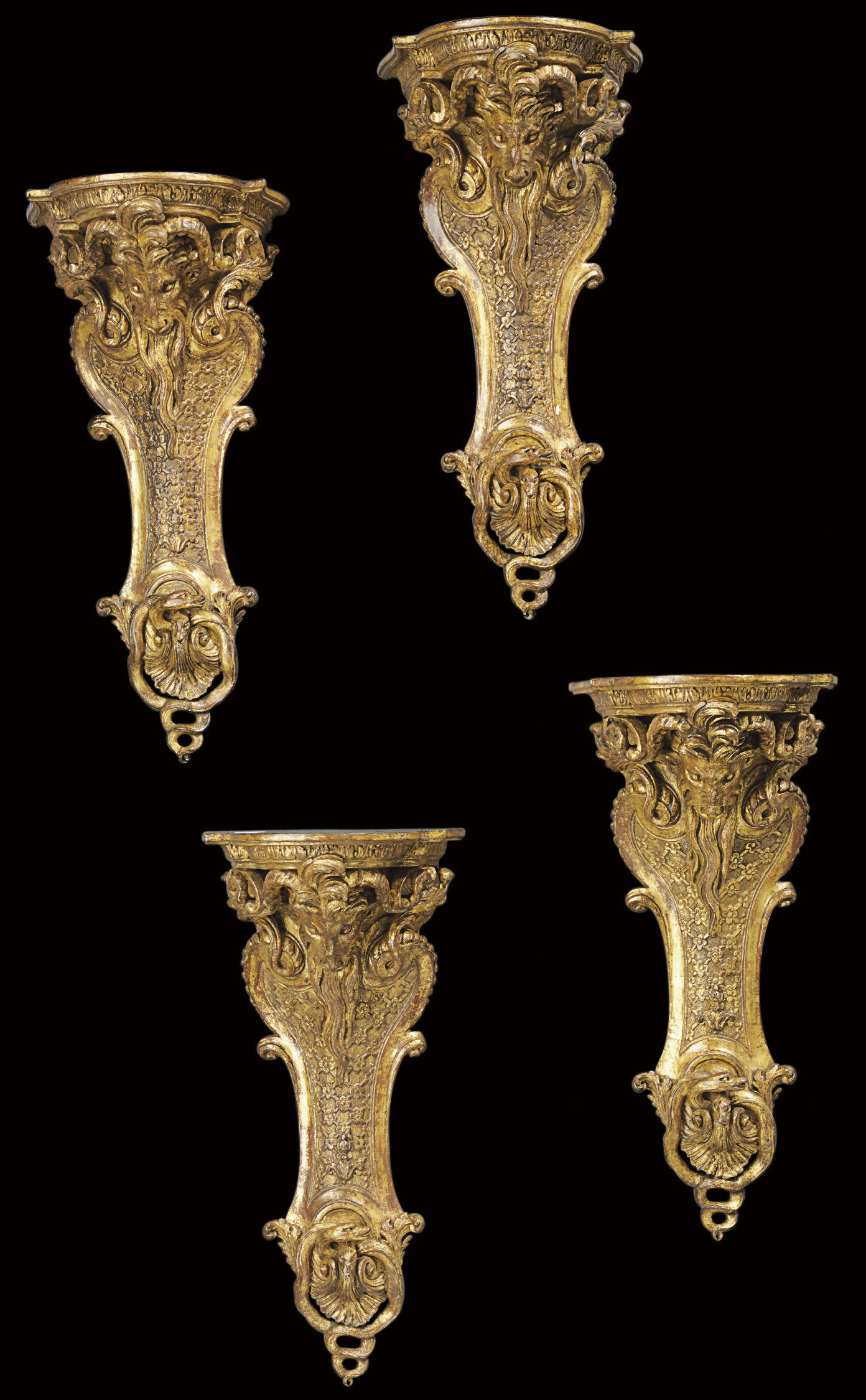 A SET OF FOUR FRENCH GILTWOOD WALL BRACKETS