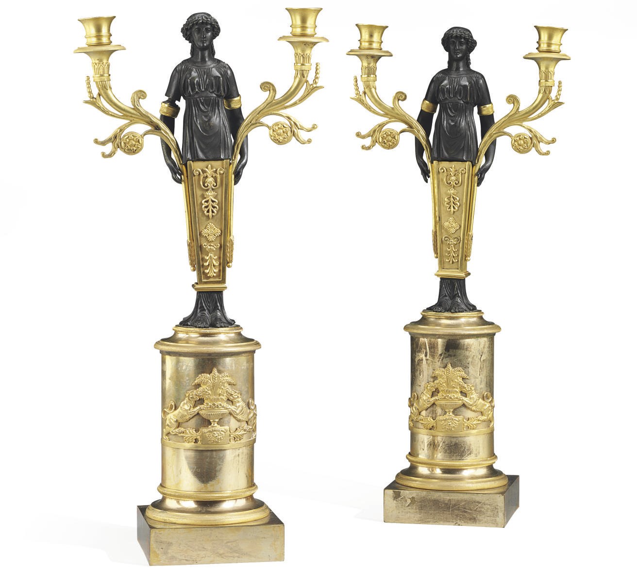 A PAIR OF EMPIRE ORMOLU AND PATINATED BRONZE TWIN-BRANCH CANDELABRA