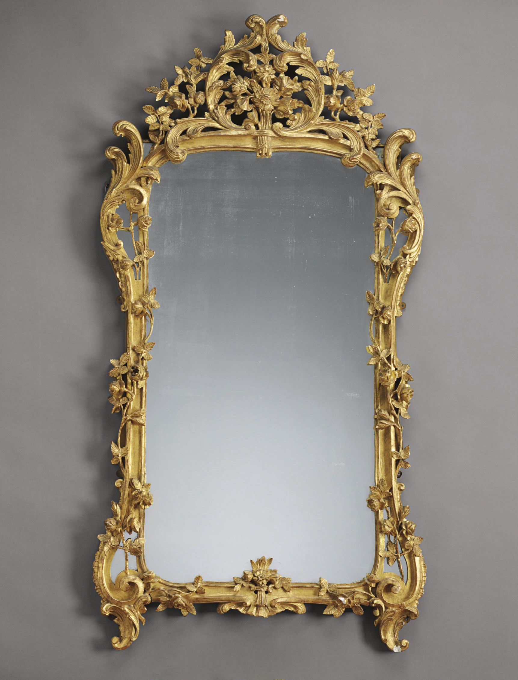 A LOUIS XV GILTWOOD MIRROR