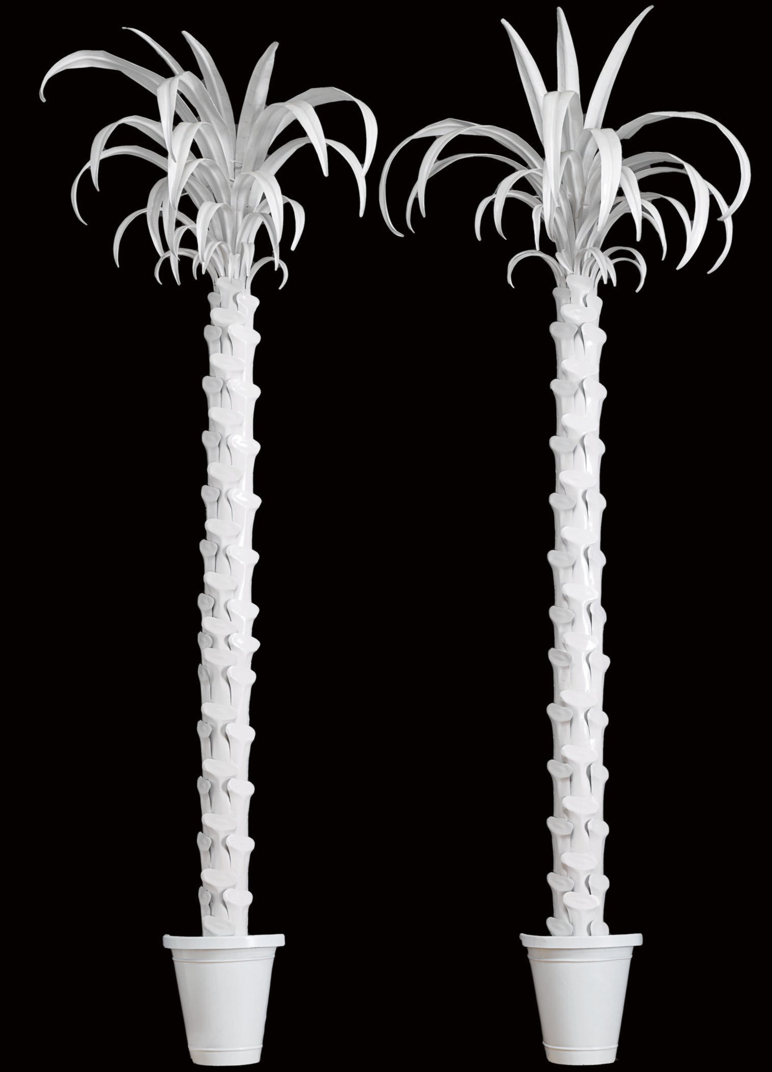 A PAIR OF WHITE-PAINTED METAL PALM TREES