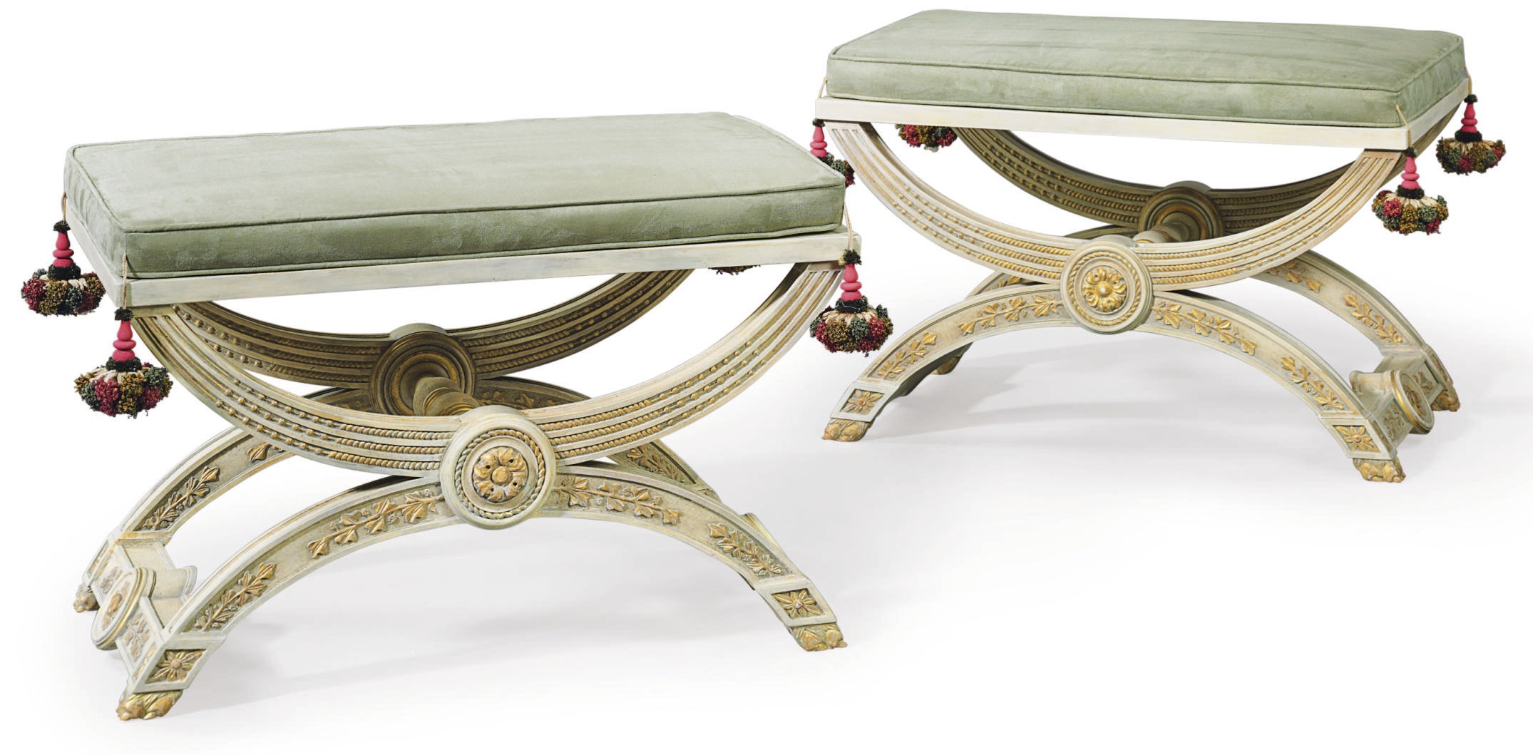 A PAIR OF FRENCH CREAM-PAINTED AND PARCEL-GILT X-FRAME STOOLS