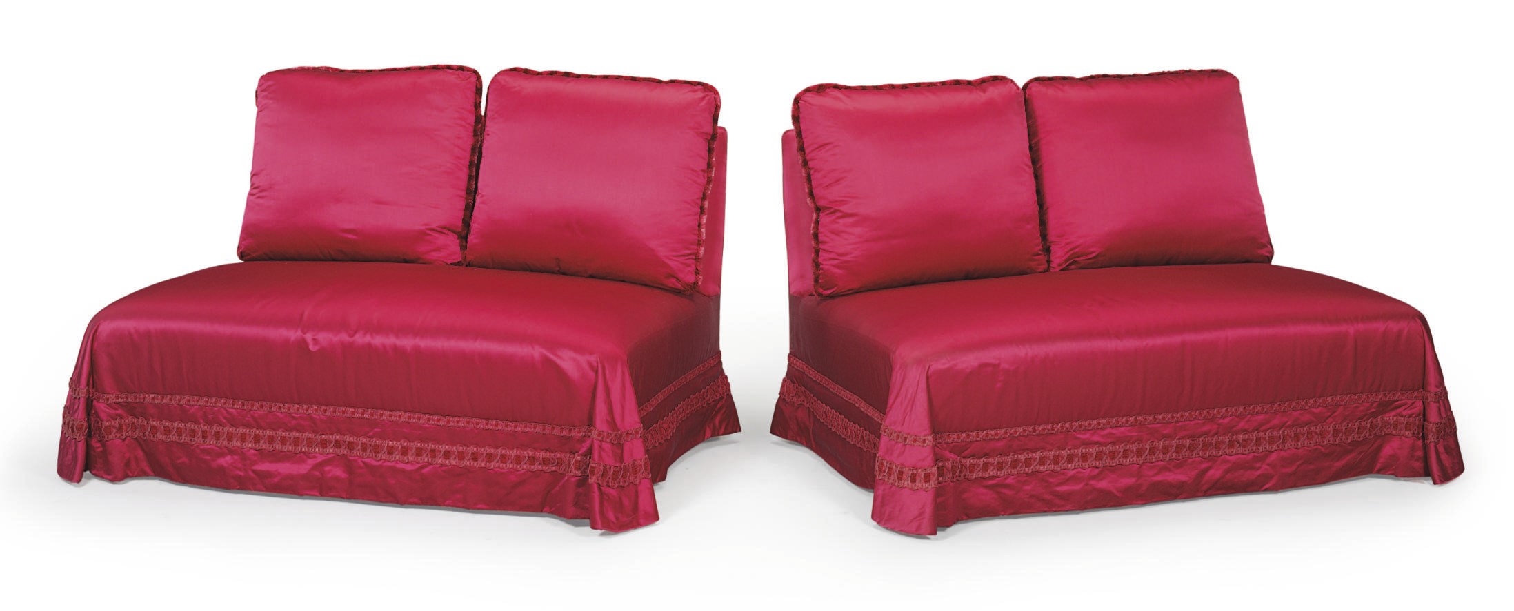 A PAIR OF CRIMSON SILK-UPHOLSTERED LOVESEATS