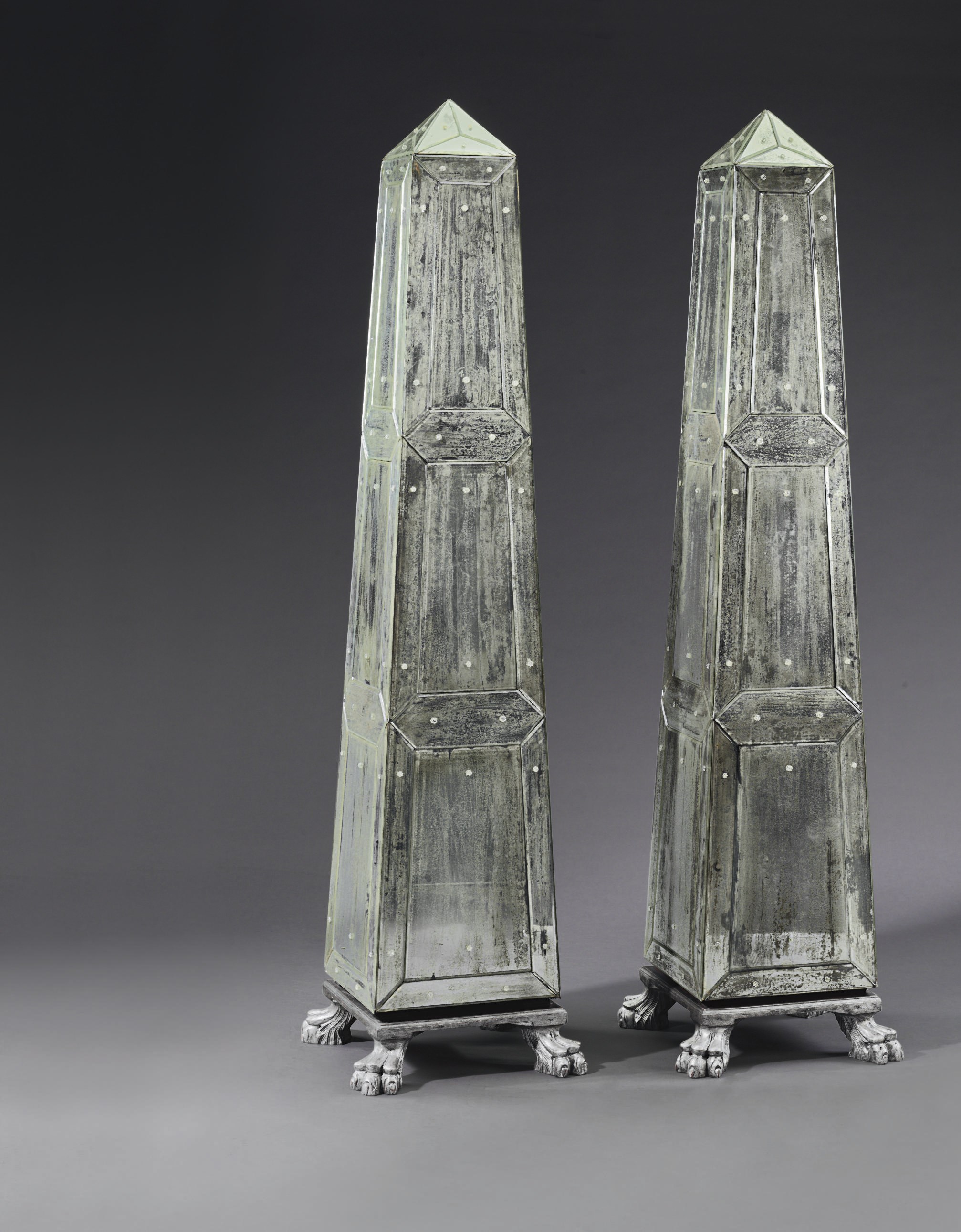 A PAIR OF MIRRORED OBELISKS