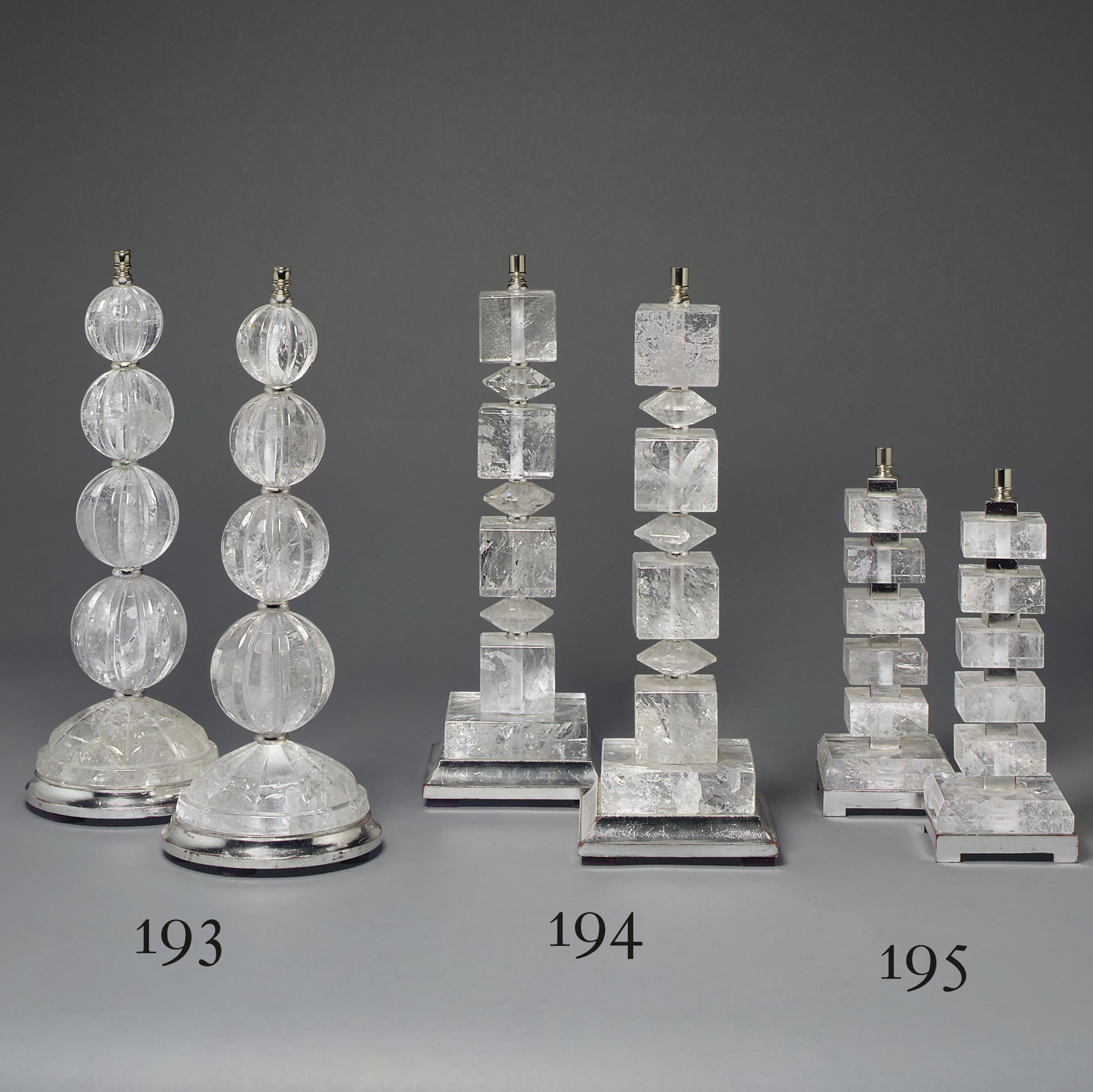 A PAIR OF ROCK CRYSTAL AND SILVERED LAMPS