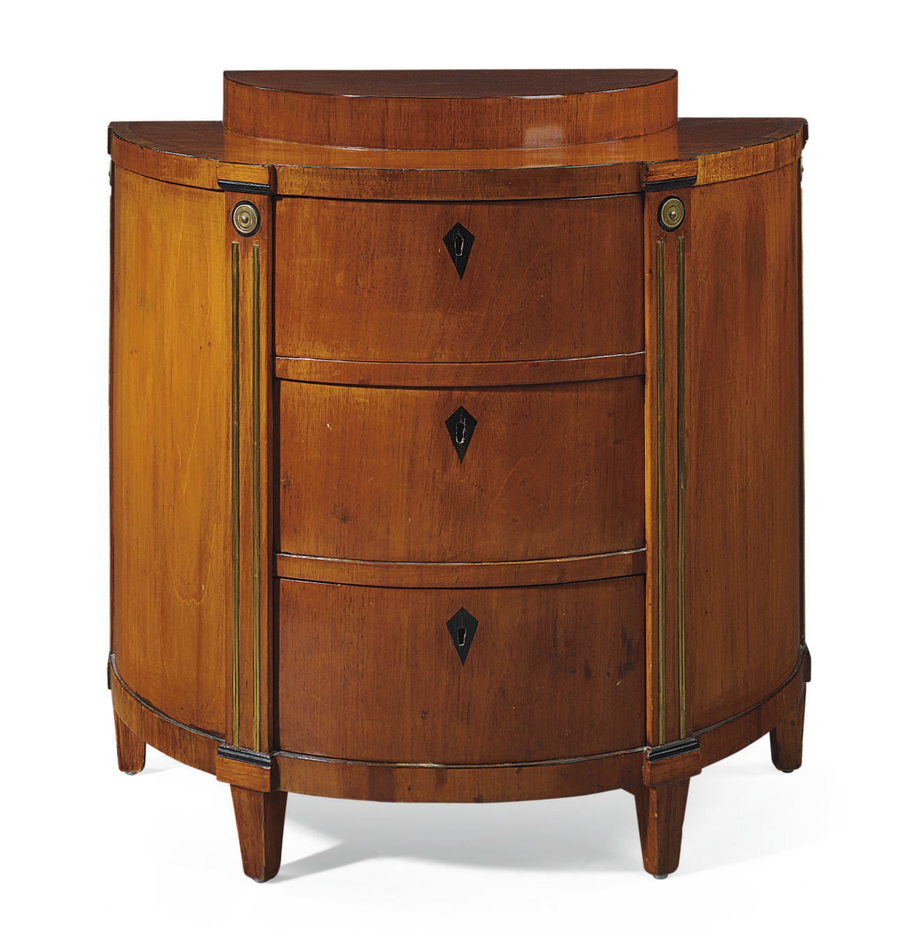 A RUSSIAN BRASS-MOUNTED AND EBONIZED COMMODE