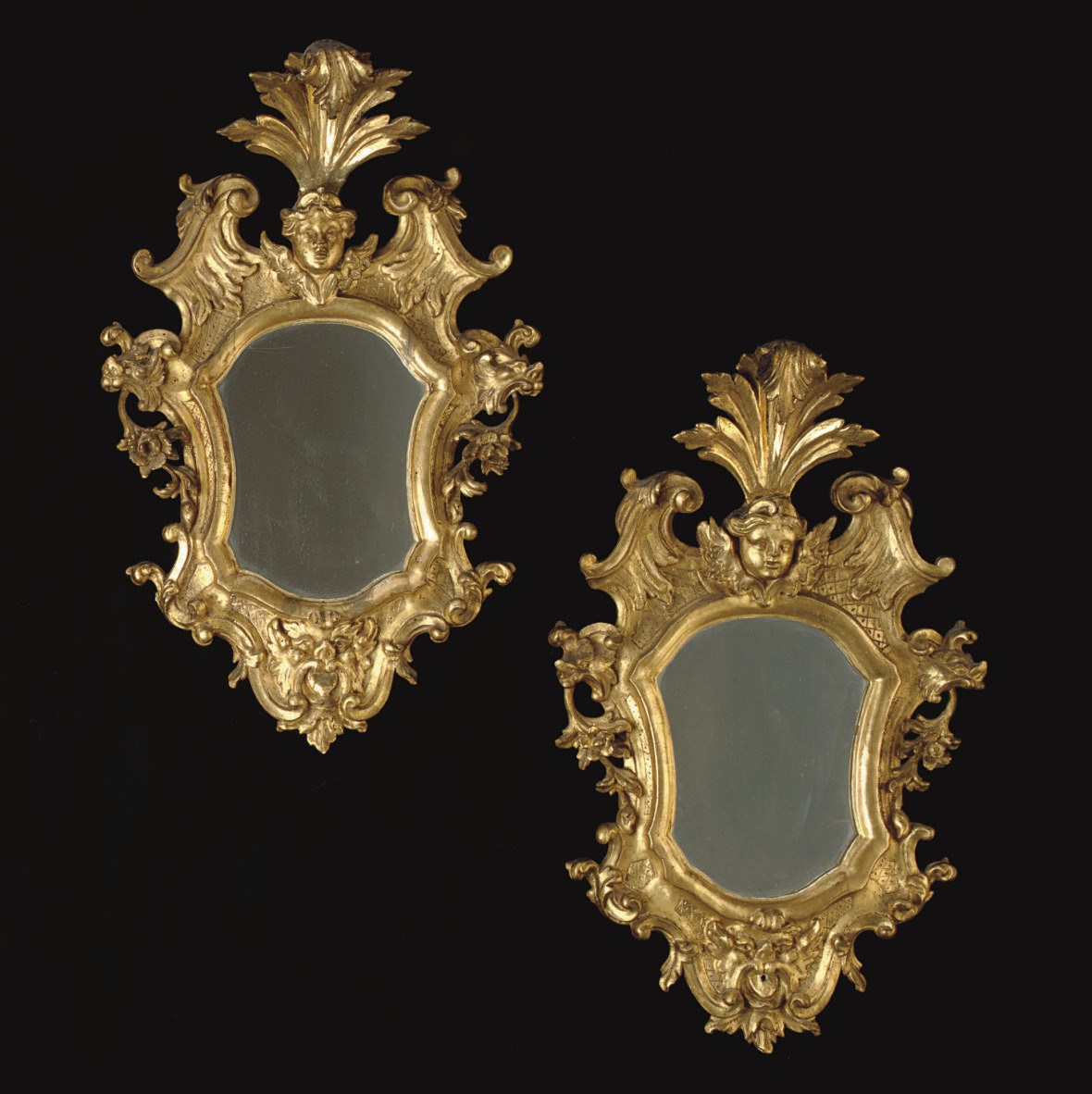 A PAIR OF ITALIAN GILTWOOD MIRRORS