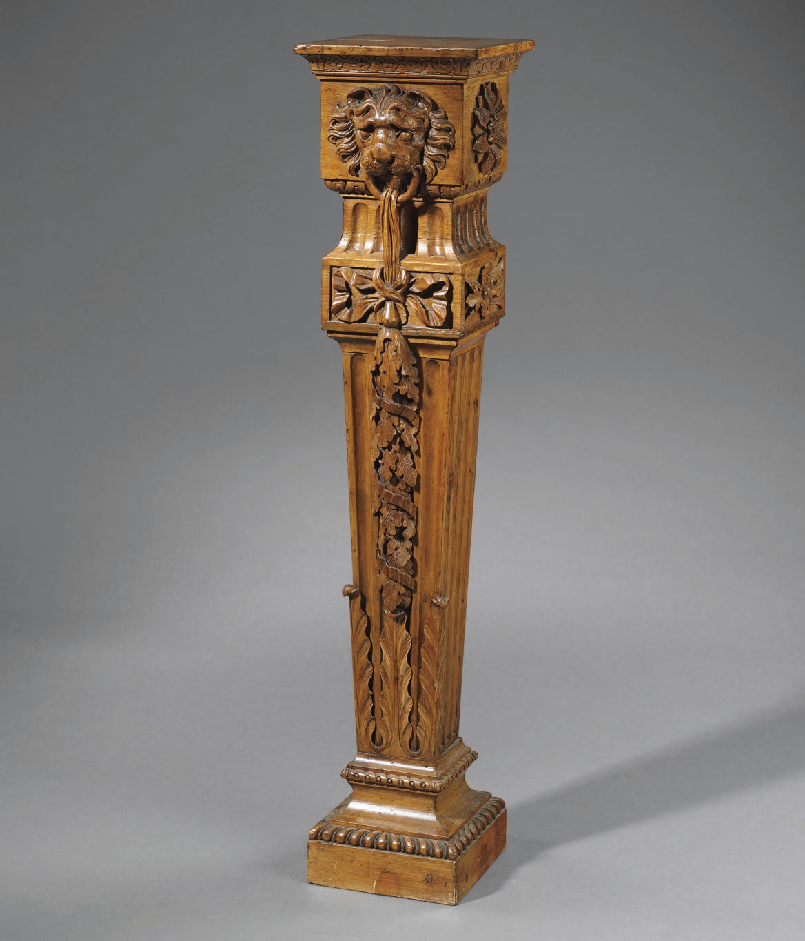 A STAINED PINE PEDESTAL