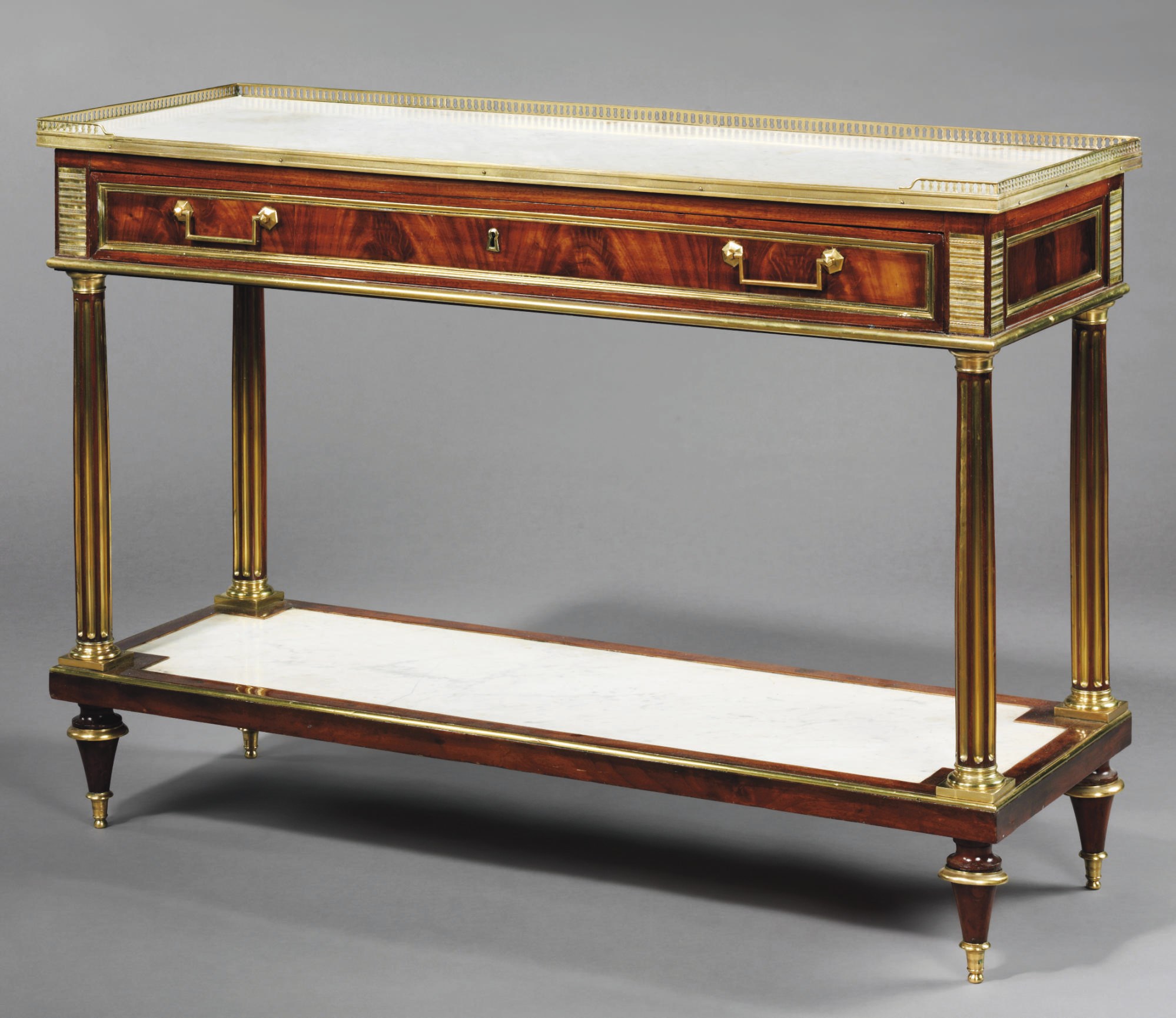 A LOUIS XVI BRASS-MOUNTED MAHOGANY CONSOLE DESSERTE
