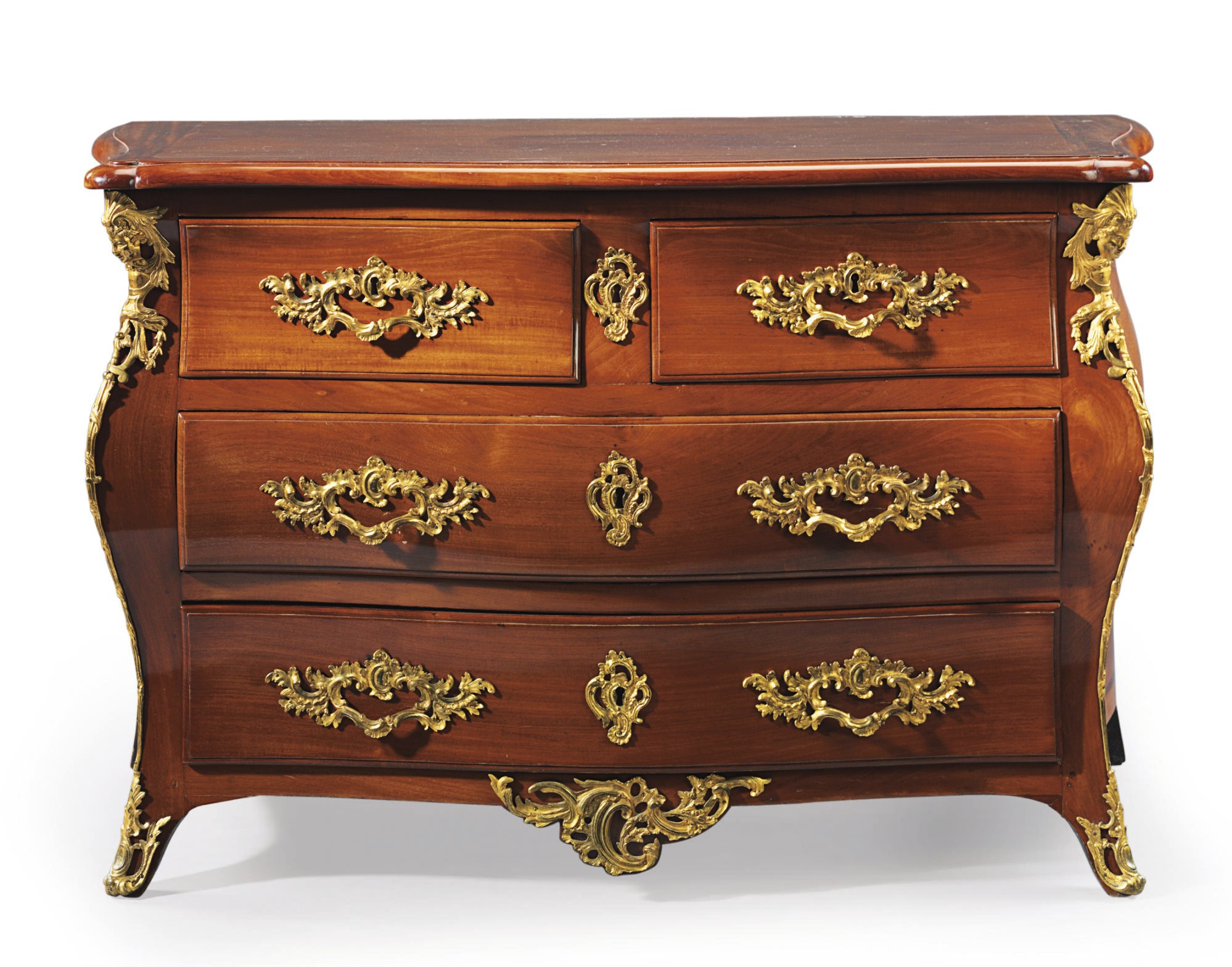 A LOUIS XV PROVINCIAL ORMOLU-MOUNTED MAHOGANY COMMODE