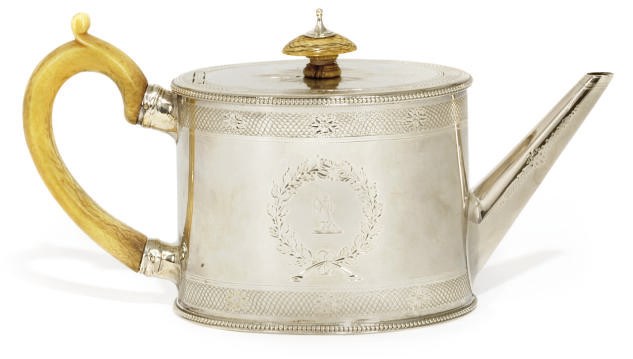 A GEORGE III OVAL SILVER TEAPOT WITH BEAD BORDERS