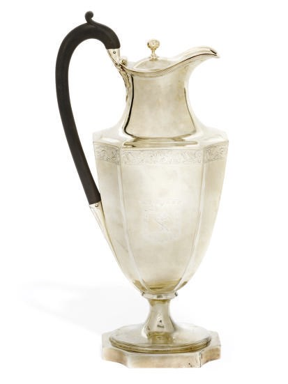 A GEORGE III SILVER HOT WATER JUG