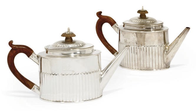 A PAIR OF GEORGE III SILVER TEAPOTS