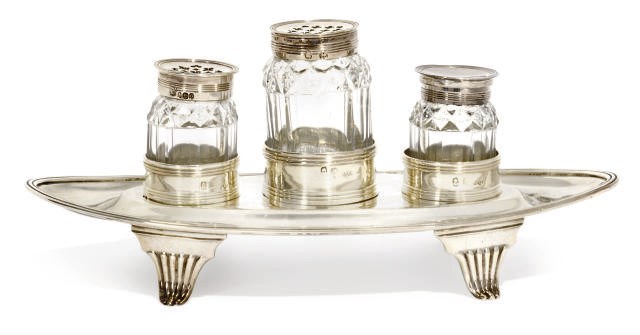 A SMALL GEORGE III SILVER THREE-BOTTLE INKSTAND