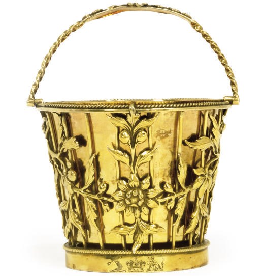 A SILVER-GILT OPENWORK SUGAR BASKET