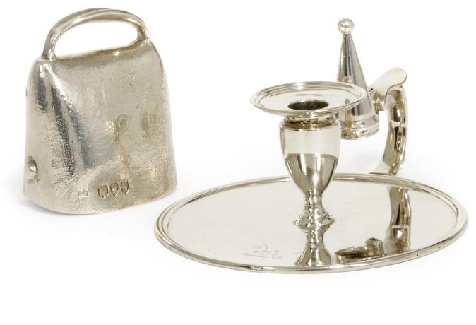 A GEORGE III SILVER CHAMBERSTICK