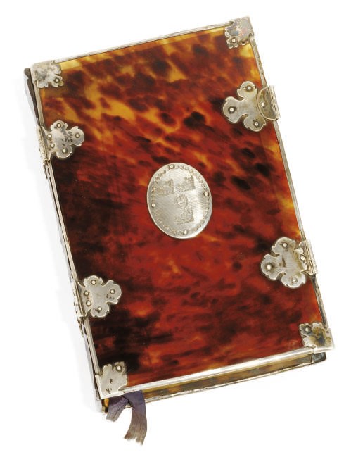 A GEORGE I SILVER-MOUNTED TORTOISESHELL BOOK COVER