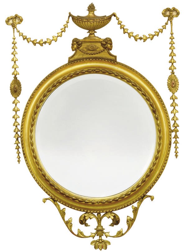 A LATE VICTORIAN GILTWOOD WALL MIRROR