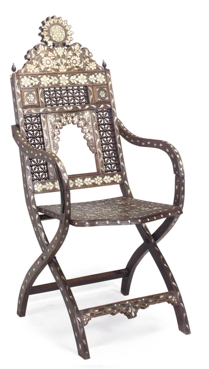 AN EASTERN HARDWOOD AND MOTHER OF PEARL INLAID ARMCHAIR