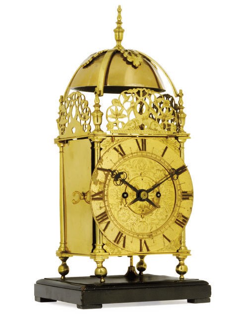 A Victorian brass quarter striking lantern clock