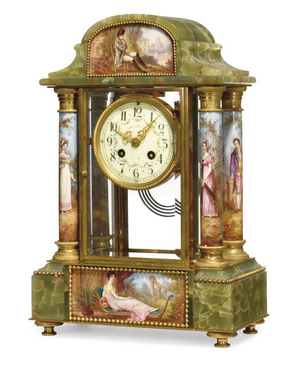 A French gilt-brass and porcelain-mounted green onyx striking eight day four glass mantel clock