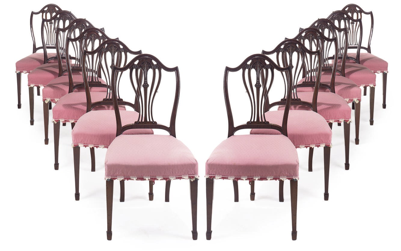 A SET OF TWELVE EDWARDIAN MAHOGANY DINING CHAIRS