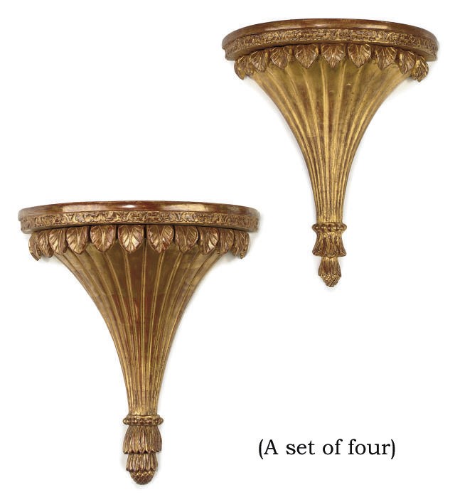 A SET OF FOUR GILT-WOOD WALL BRACKETS