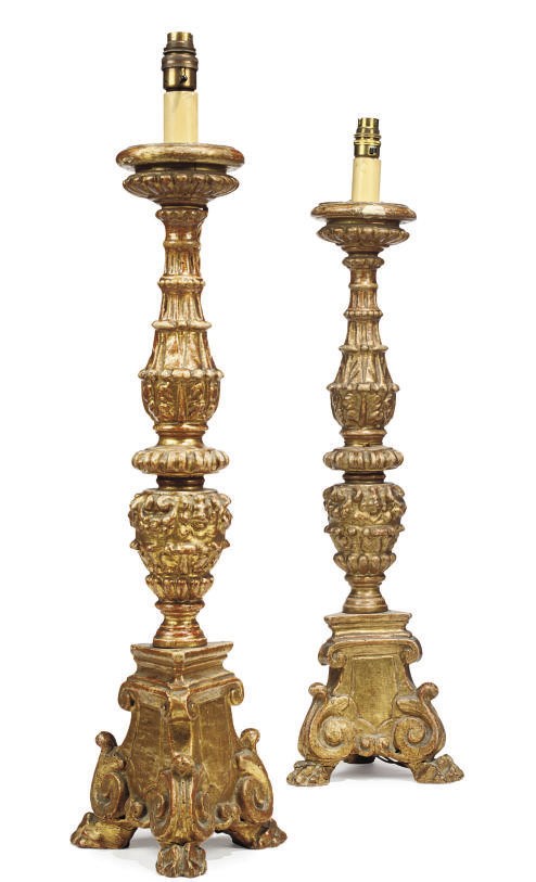 A PAIR OF ITALIAN GILT-WOOD ALTARSTICKS