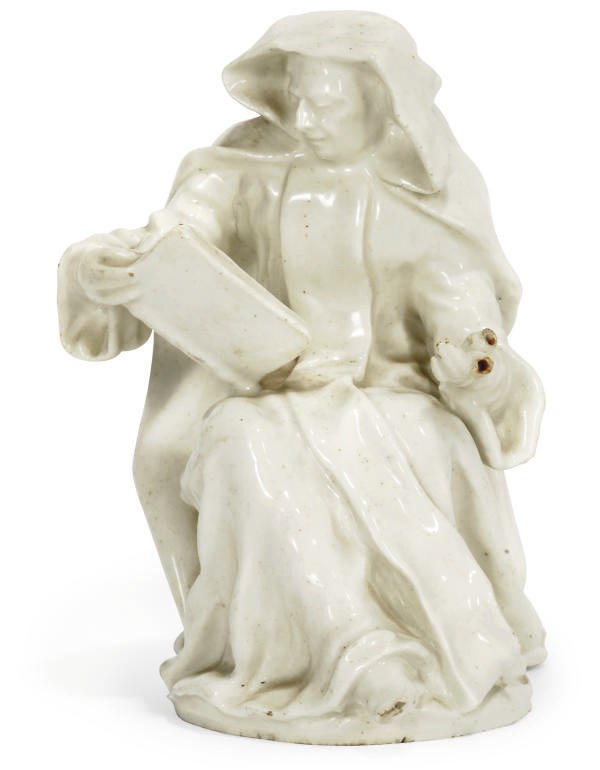 A BOW WHITE PORCELAIN FIGURE OF A NUN