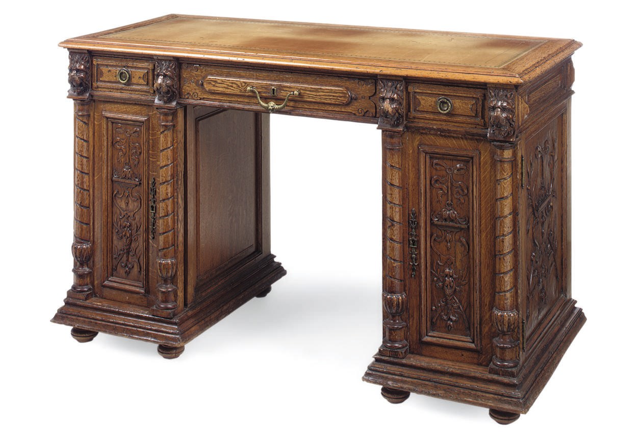 A VICTORIAN OAK PEDESTAL DESK