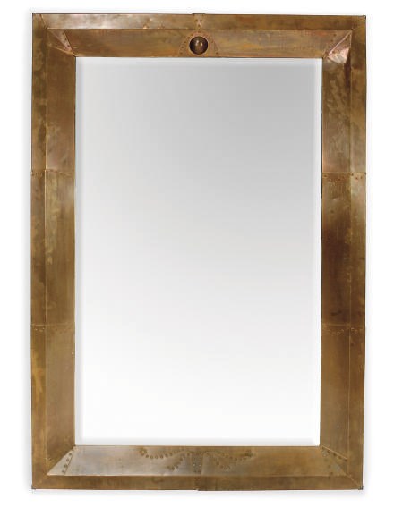 A LARGE ENGLISH COPPER MIRROR
