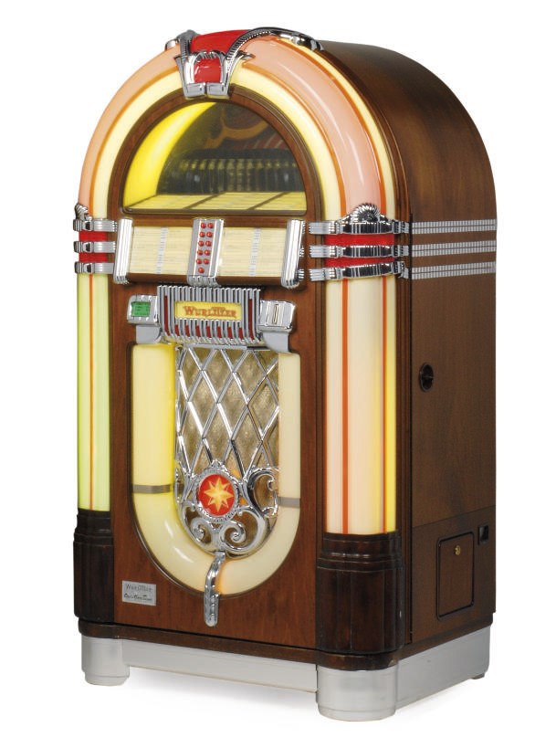 A CHROME-PLATED AND MOUNTED WURLITZER JUKE BOX