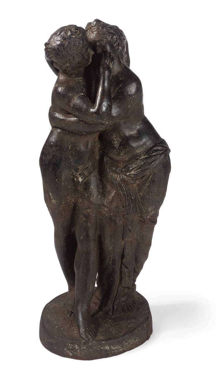 A CAST-IRON FIGURAL GROUP