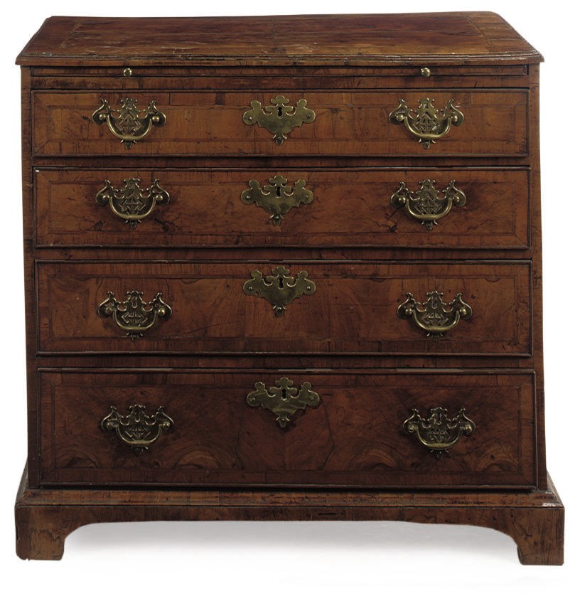 A GEORGE II WALNUT CROSSBANDED AND FEATHER BANDED CHEST