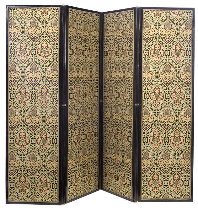 A LATE VICTORIAN PARCEL GILT AND EBONISED FOUR FOLD SCREEN