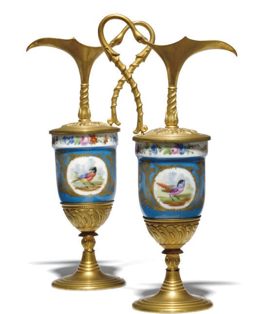 A PAIR OF SEVRES-STYLE PORCELAIN GILT-METAL-MOUNTED EWERS