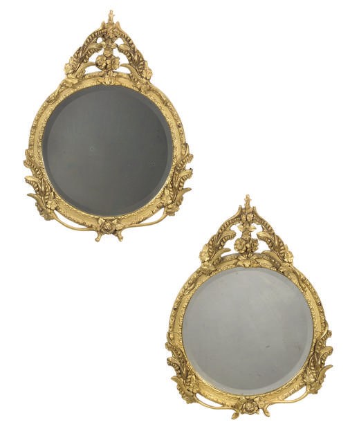 A PAIR OF LATE VICTORIAN GILT COMPOSITION MIRRORS