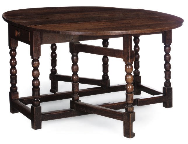 AN OAK GATELEG TABLE