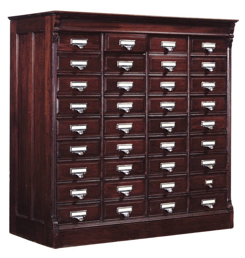A MAHOGANY FILING CABINET