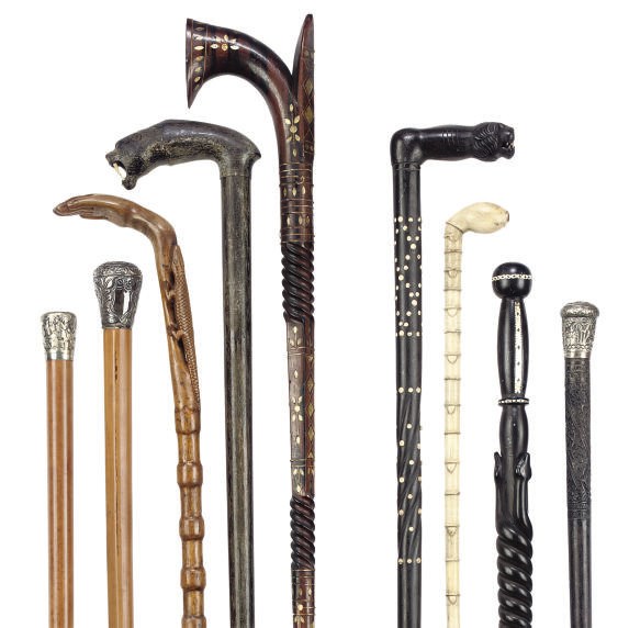 A COLLECTION OF TEN INLAID WALKING STICKS