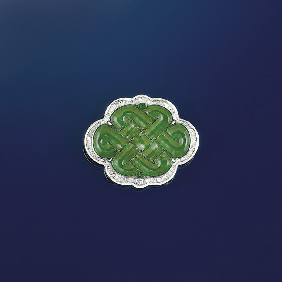 A jadeite and diamond brooch