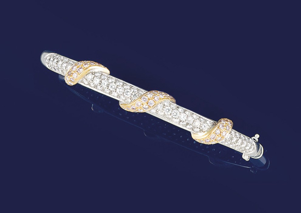 A diamond and coloured diamond bangle
