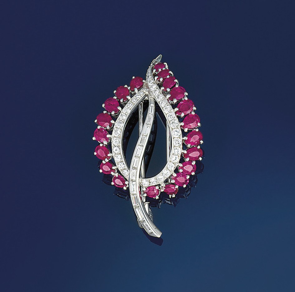 A ruby and diamond brooch, by Mellerio
