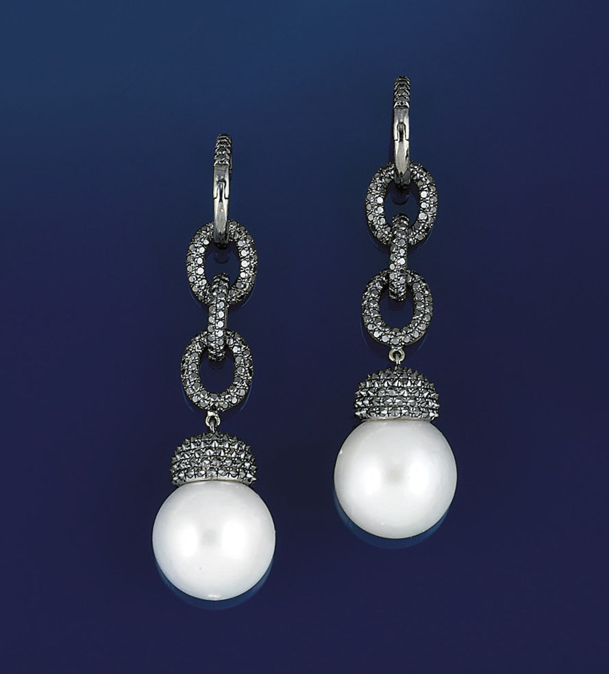 A pair of cultured pear and diamond earrings