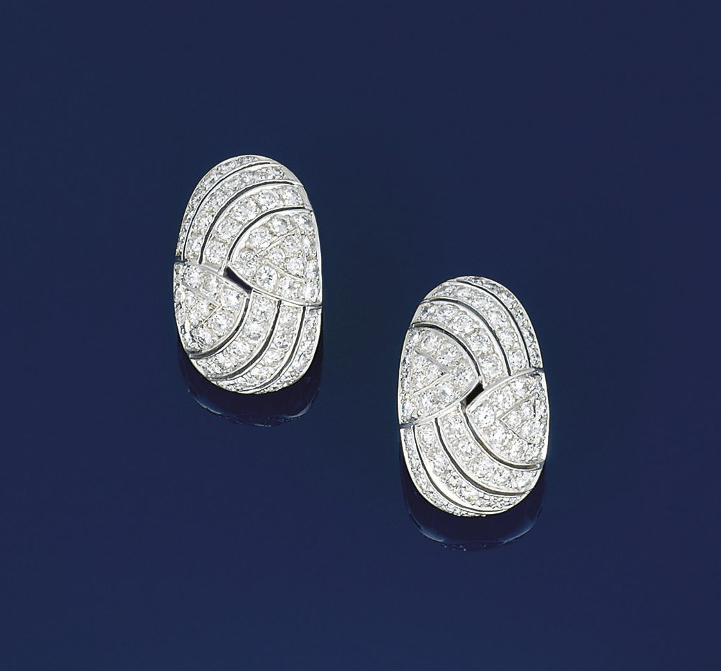 A pair of diamond earclips