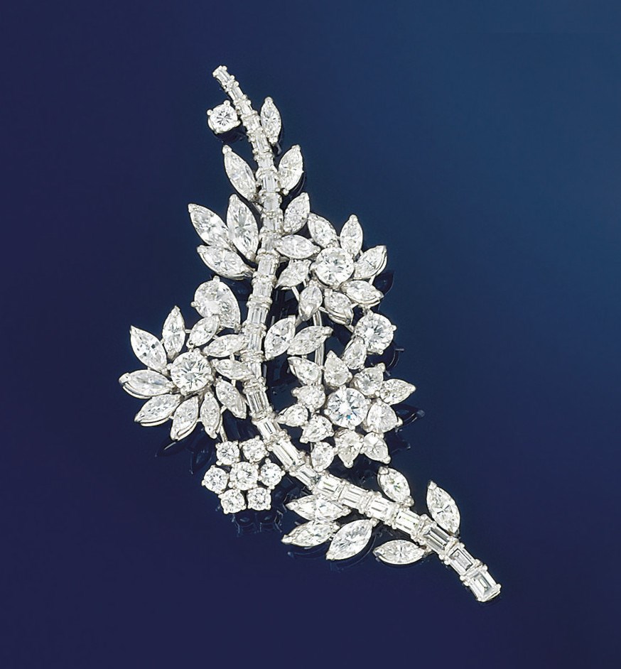 A diamond cluster brooch