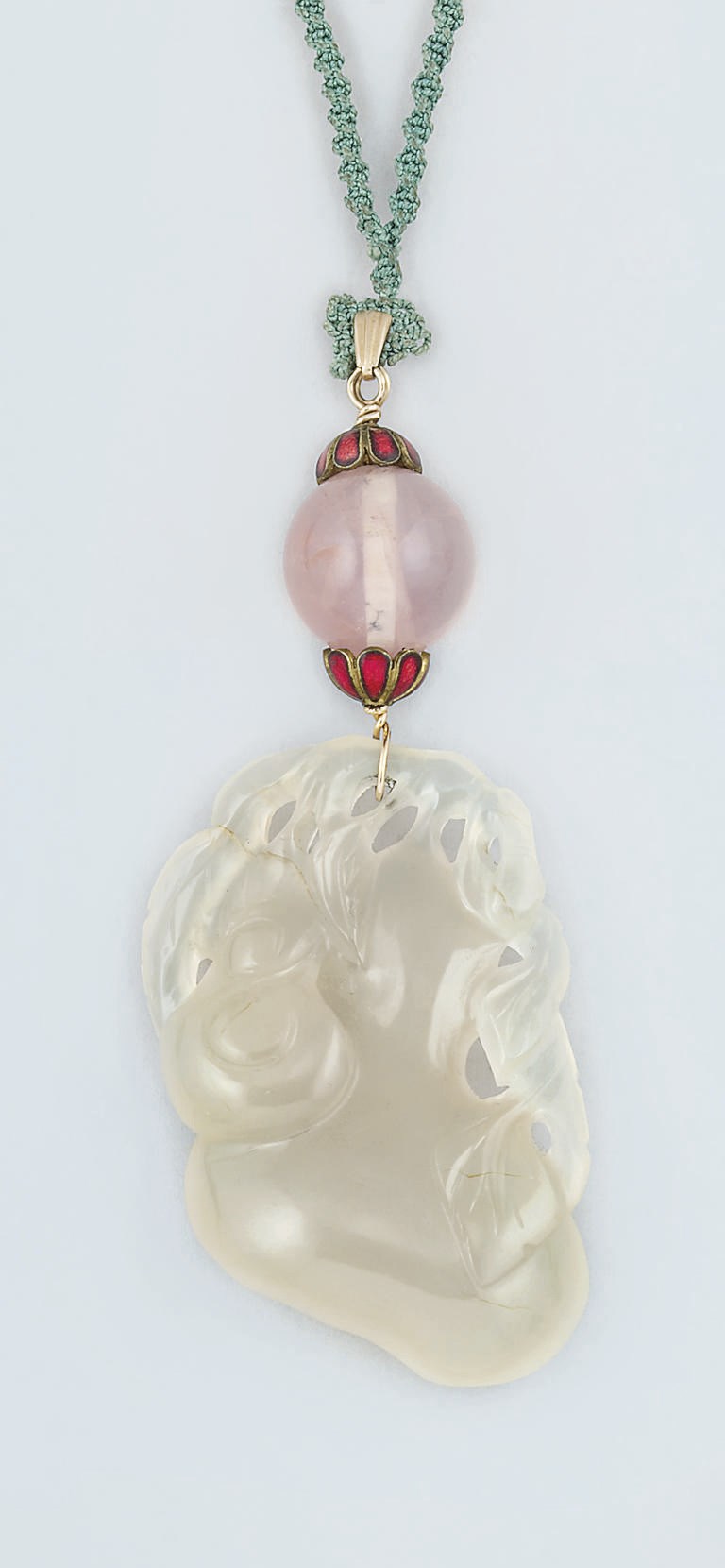 A Chinese jade and rose quartz pendant