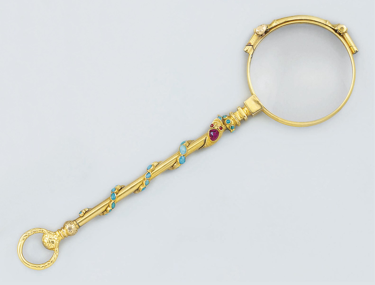 A pair of late 19th century gold and gem lorgnettes